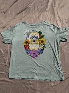 ModelCo Light Blue Graphic Tee with Floral Modelo Print